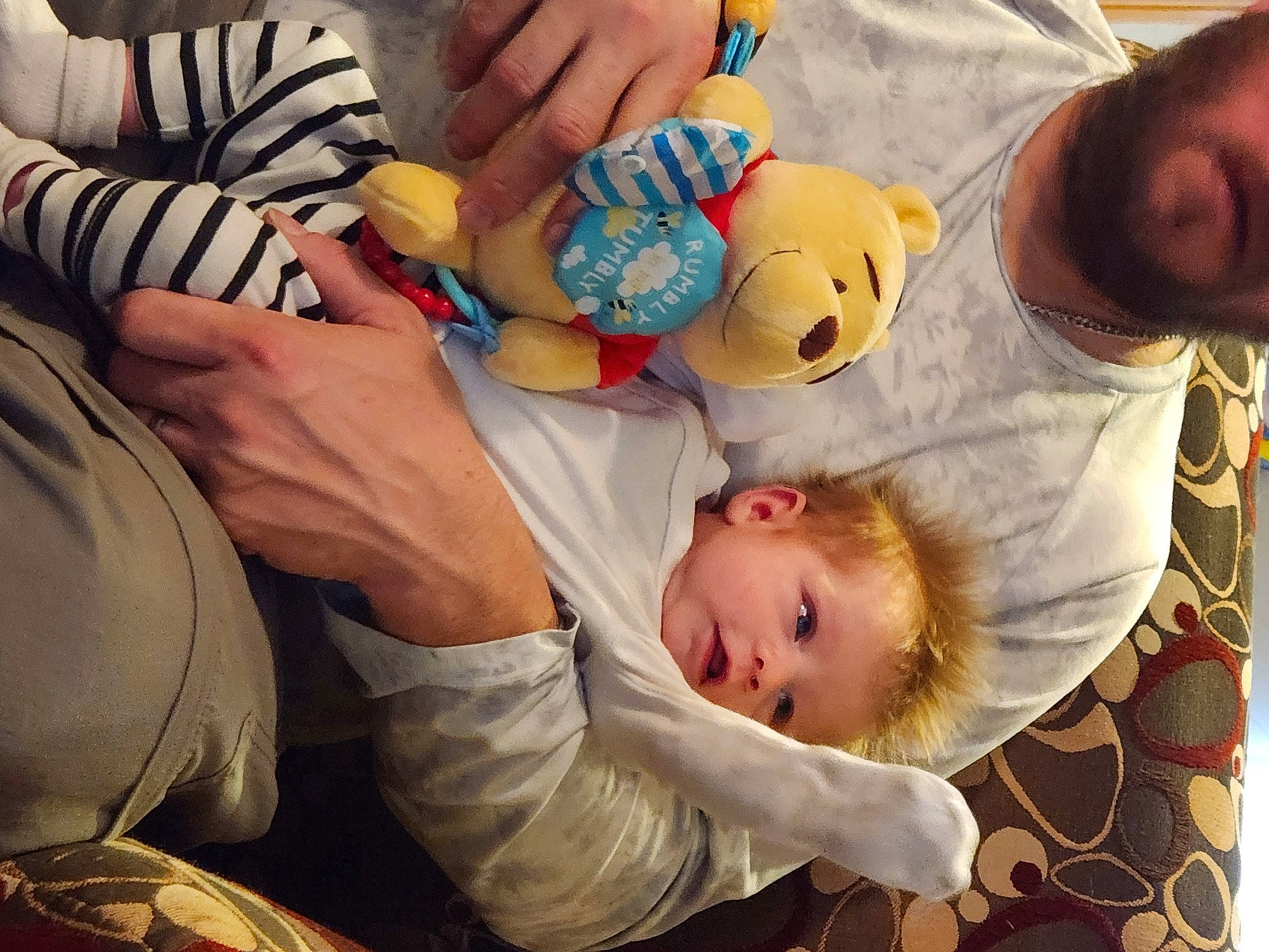 Addy is registered to the contest to win money with this photo: arm, baby, baby_products, child, comfort, finger, fun, gesture, hand, happy, hat, human_body, interaction, mouth, nail, people, person, skin, thumb, toddler