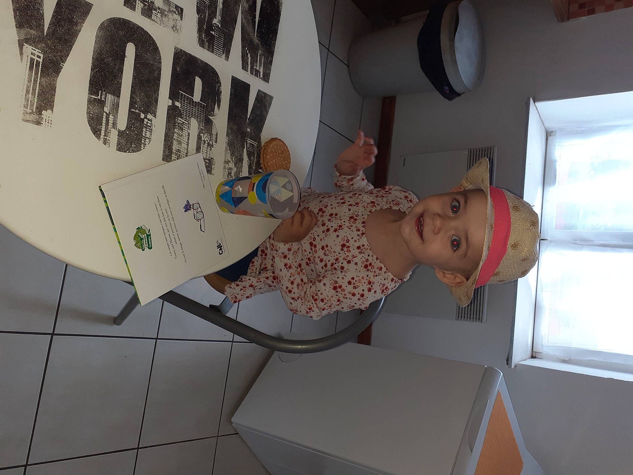 Inaya participe au concours pour gagner de l'argent avec cette photo : art, clock, creative_arts, fashion, font, fun, hat, headwear, joy, paper, paper_product, pattern, person, plaster, room, smile, visual_arts, white, window