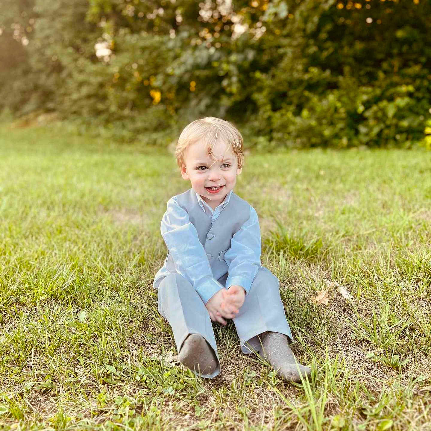 Austin joined the competition — help win amazing prizes! blonde, boy, child, clothing, face, hair, happy, head, hosiery, male, pants, person, sitting, sock