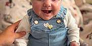 Assia participe au concours pour gagner de l'argent avec cette photo : baby, smiling, headband, bow, denim_overalls, white_shirt, tights, white_shoes, hand, indoor, cozy, person, child, cute, happy, sitting, face, portrait, infant, support