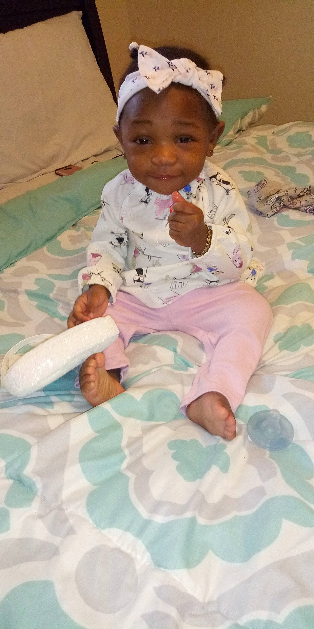 Caylee is registered to the contest to win money with this photo: bed, child, day, fun, girl, infant, material, person, product, textile, toddler, white