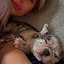Bella is registered to the contest to win money with this photo: person, puppy, sleeping, resting, arm, carpet, closeup, face, dog, pet, cute, animal, cozy, relaxation, companion, indoor, skin, blond_hair, lying_down, nap