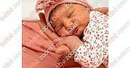 Kamyra participe au concours pour gagner de l'argent avec cette photo : newborn, baby, sleeping, headband, flower, pink, infant, hands, cradling, soft, portrait, closeup, cute, peaceful, child, resting, apparel, pattern, fabric, skin