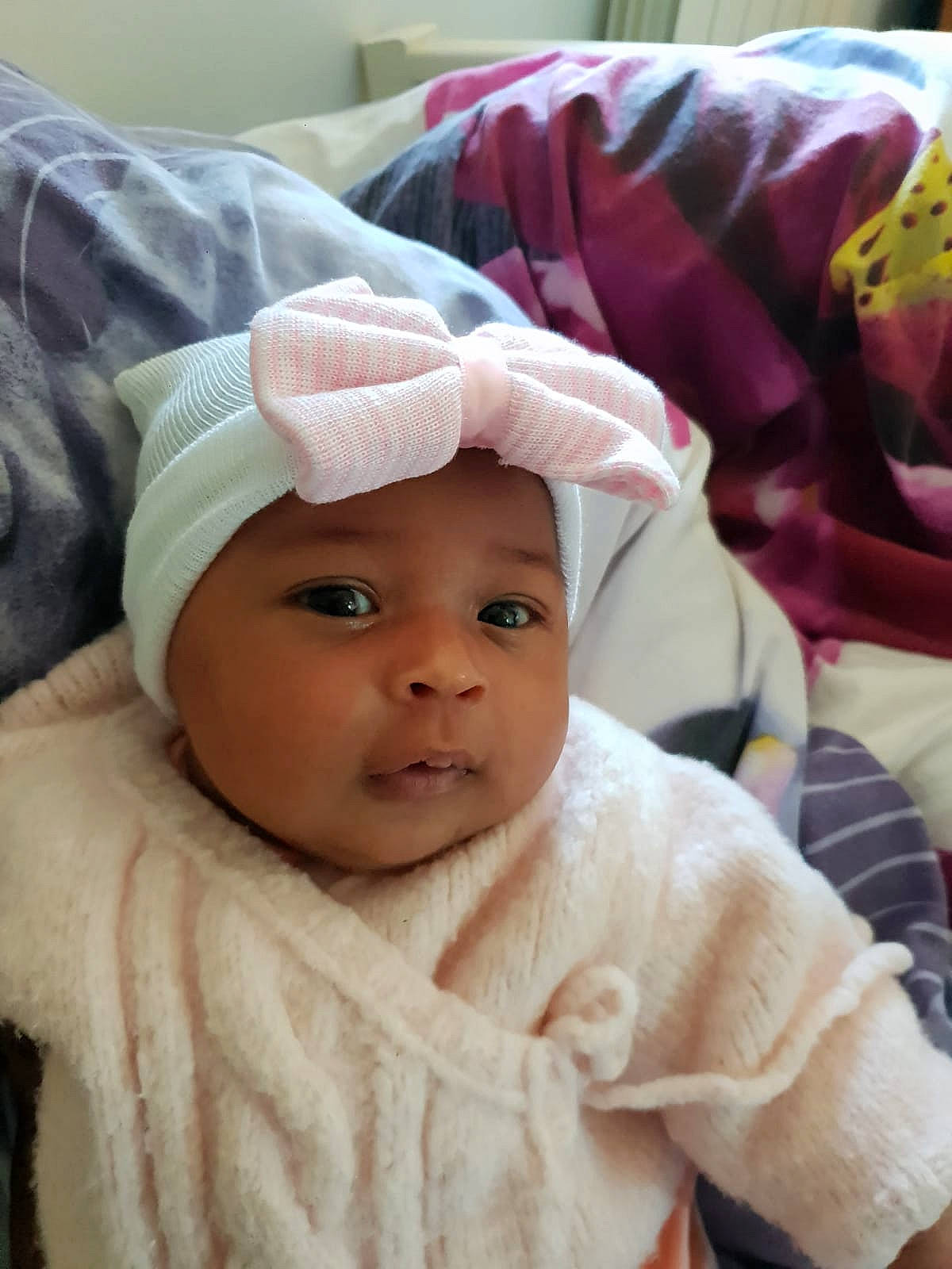 Kyara participe au concours pour gagner de l'argent avec cette photo : baby, cheek, child, eye, face, head, headgear, headwear, linens, person, skin, toddler