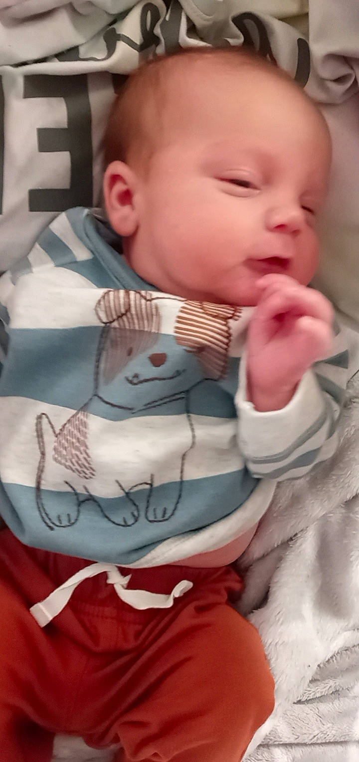 Edward is registered to the contest to win money with this photo: baby, baby_products, baby_toddler_clothing, cheek, child, chin, comfort, drinkware, eyebrow, eyelash, finger, forehead, lip, mouth, neck, nose, person, skin, sleeve, toddler