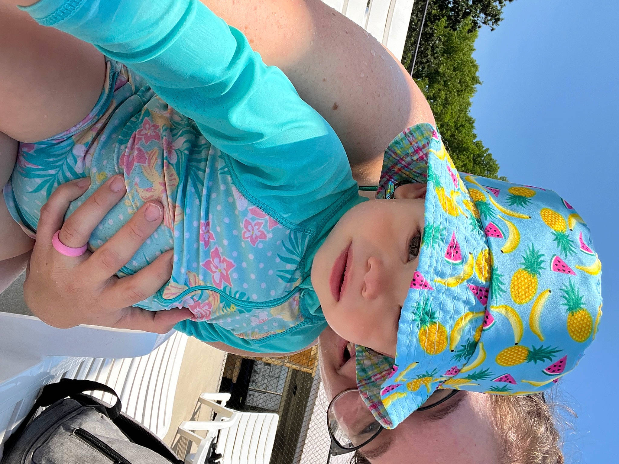 Izabella is registered to the contest to win money with this photo: arm, beauty, child, elbow, electric_blue, eyewear, finger, fun, grass, green, hand, happy, headwear, jewellery, joint, leisure, pattern, person, pink, plant