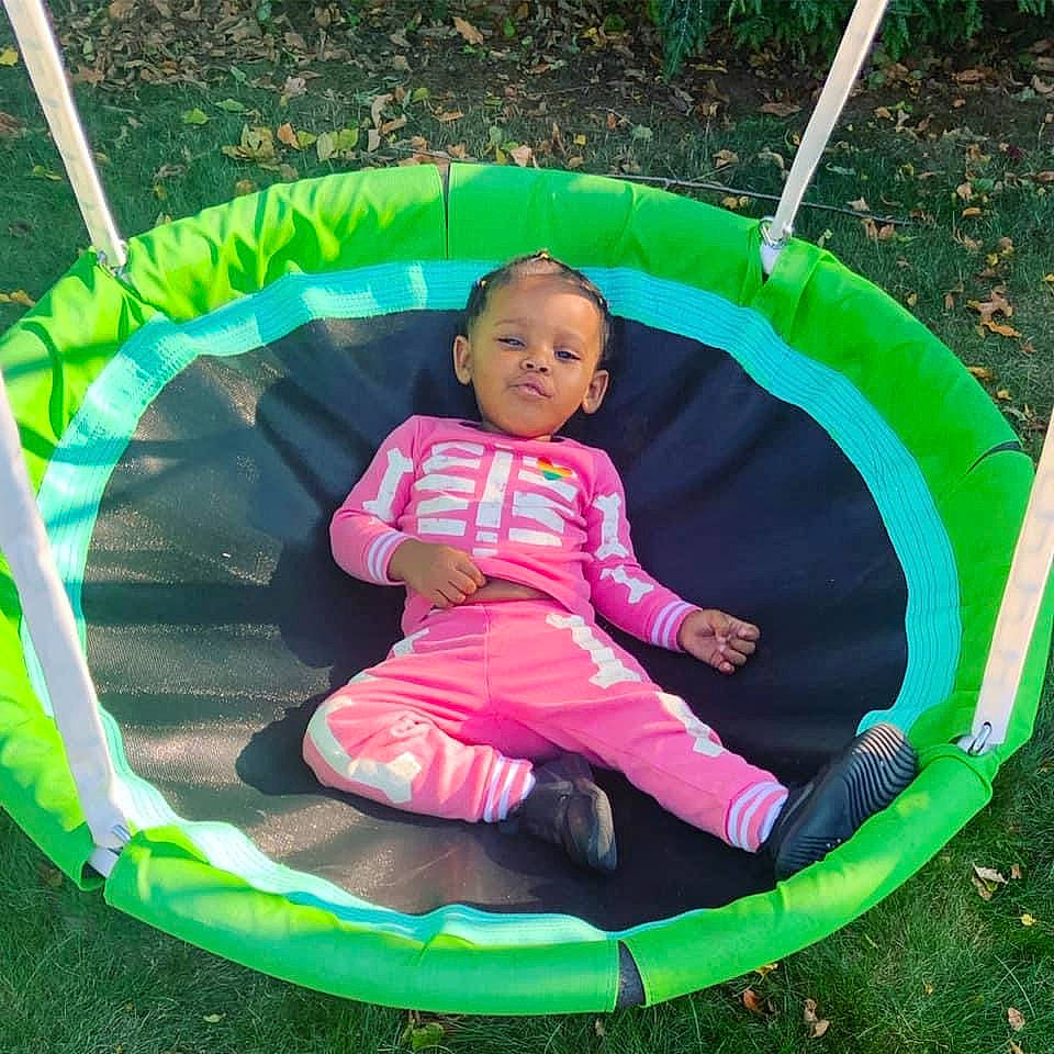 Anissa Brielle joined the competition — help win amazing prizes! baby, baby_toddler_clothing, child, circle, comfort, fun, grass, green, head, inflatable, leisure, mammal, outdoor_play_equipment, person, plant, play, playground, recreation, sitting, summer