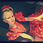 Orlane participe au concours pour gagner de l'argent avec cette photo :