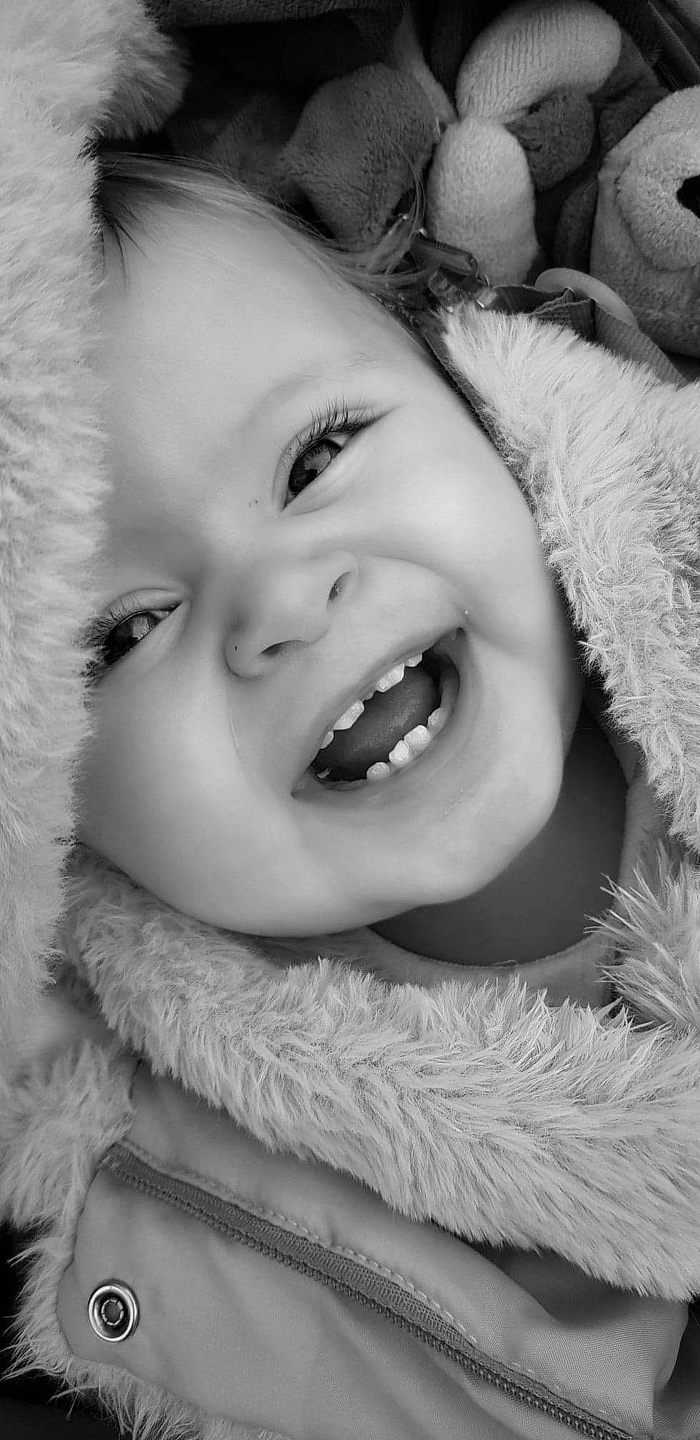 Innaya participe au concours pour gagner de l'argent avec cette photo : baby, beauty, black_and_white, cheek, child, eye, face, facial_expression, fur, happy, laugh, lip, mouth, nose, organ, person, photograph, portrait_photography, skin, smile