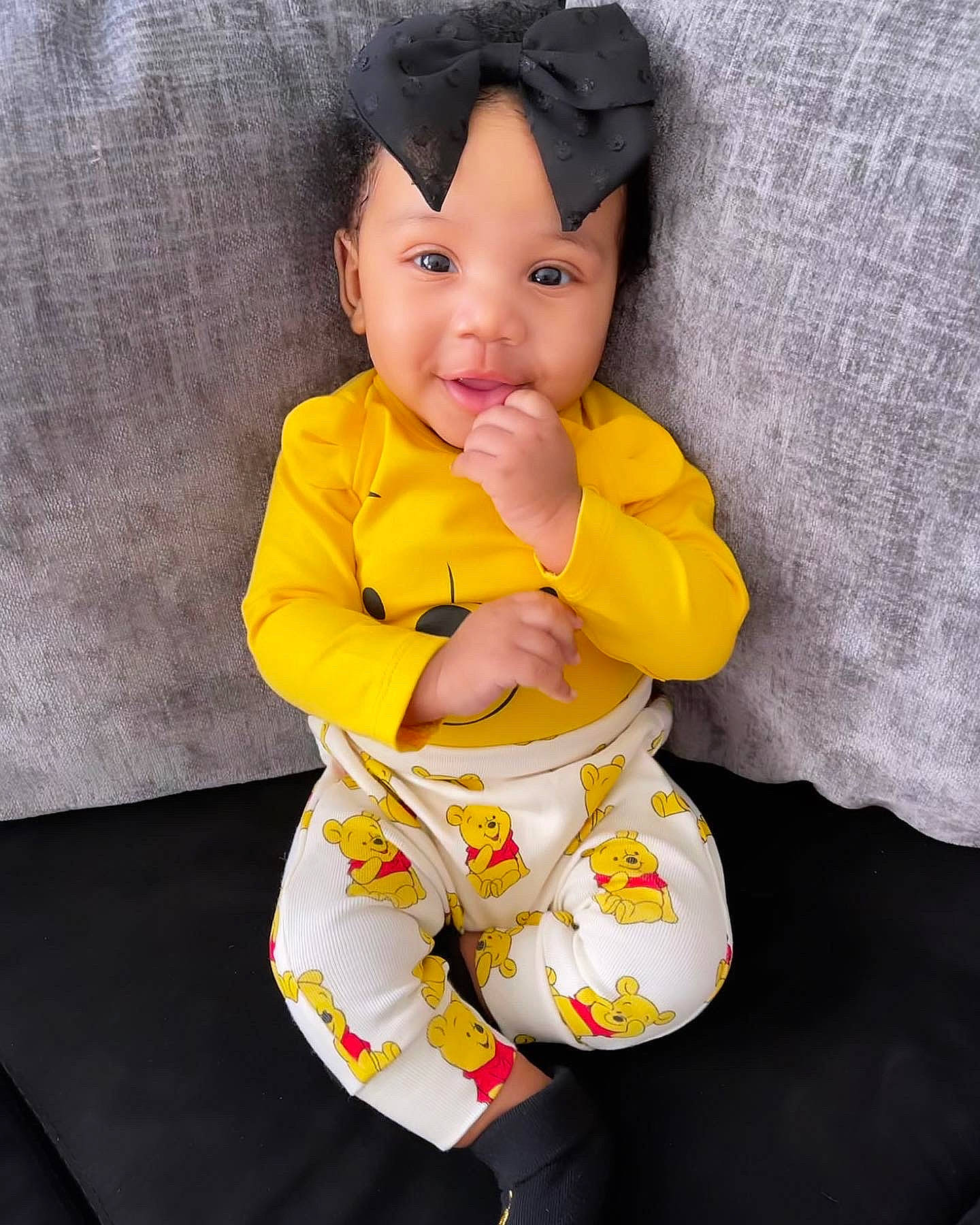 Italy is registered to the contest to win money with this photo: baby, baby_toddler_clothing, cap, cheek, child, comfort, eye, face, finger, hand, happy, head, headgear, person, skin, sleeve, smile, t_shirt, textile, thumb