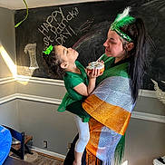 Emerald joined the competition — help win amazing prizes! adult, blackboard, blouse, clothing, eating, face, female, food, furniture, greenhair, hair, head, pants, people, person, photography, pizza, portrait, table, woman