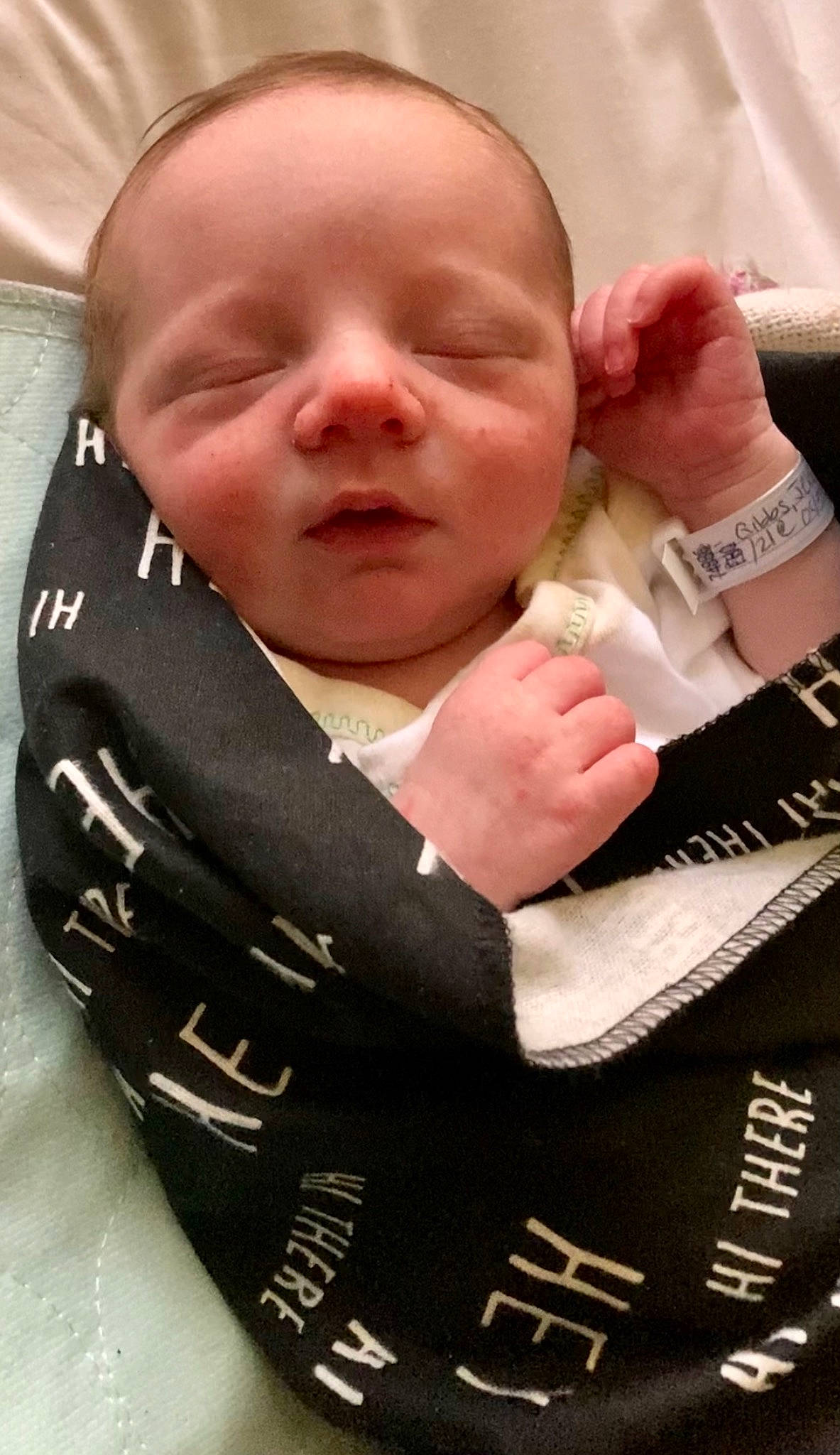 Colten is registered to the contest to win money with this photo: baby, baby_products, baby_toddler_clothing, carmine, cheek, child, comfort, fashion_accessory, finger, gesture, happy, mouth, nail, neck, nose, person, skin, sleeve, thumb, toddler