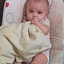 Elena is registered to the contest to win money with this photo: baby, blanket, blue_eyes, chair, clothing, comfort, cute, diaper, face, furniture, infant, indoors, pattern, person, portrait, sitting, soft, thumb_sucking, young_child, cute_expression