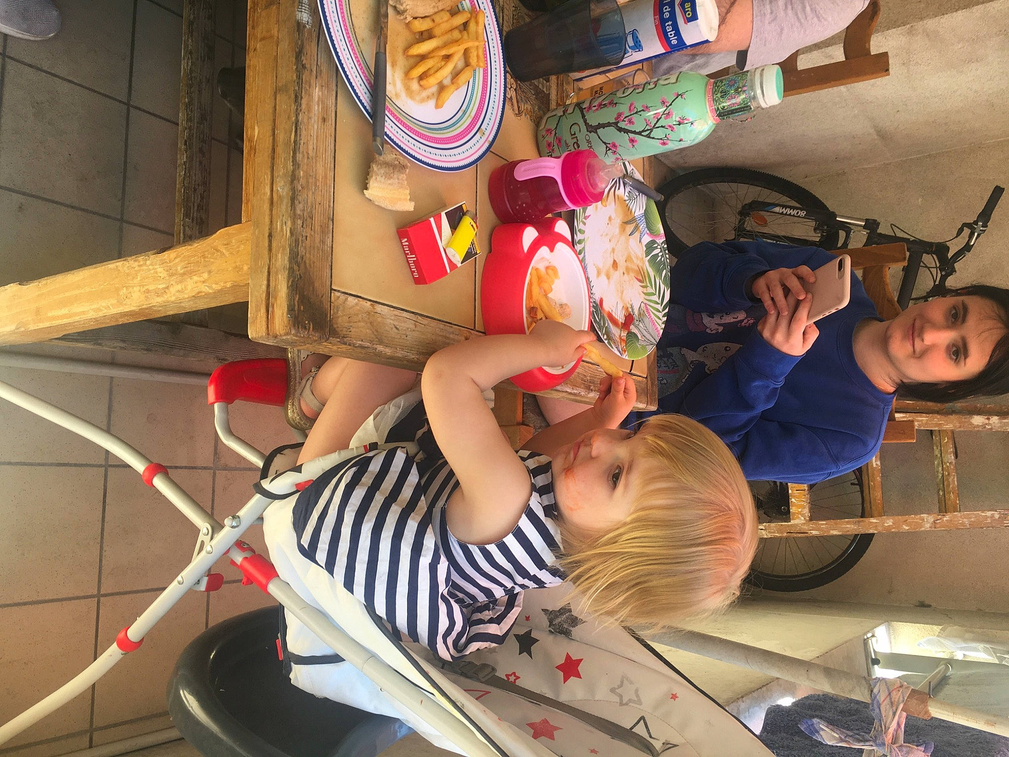 Elena participe au concours pour gagner de l'argent avec cette photo : baby, child, folk_instrument, fun, hat, joy, leisure, musical_instrument, person, play, recreation, room, sandal, shorts, stuffed_toy, t_shirt, toddler, toy, vacation, visual_arts