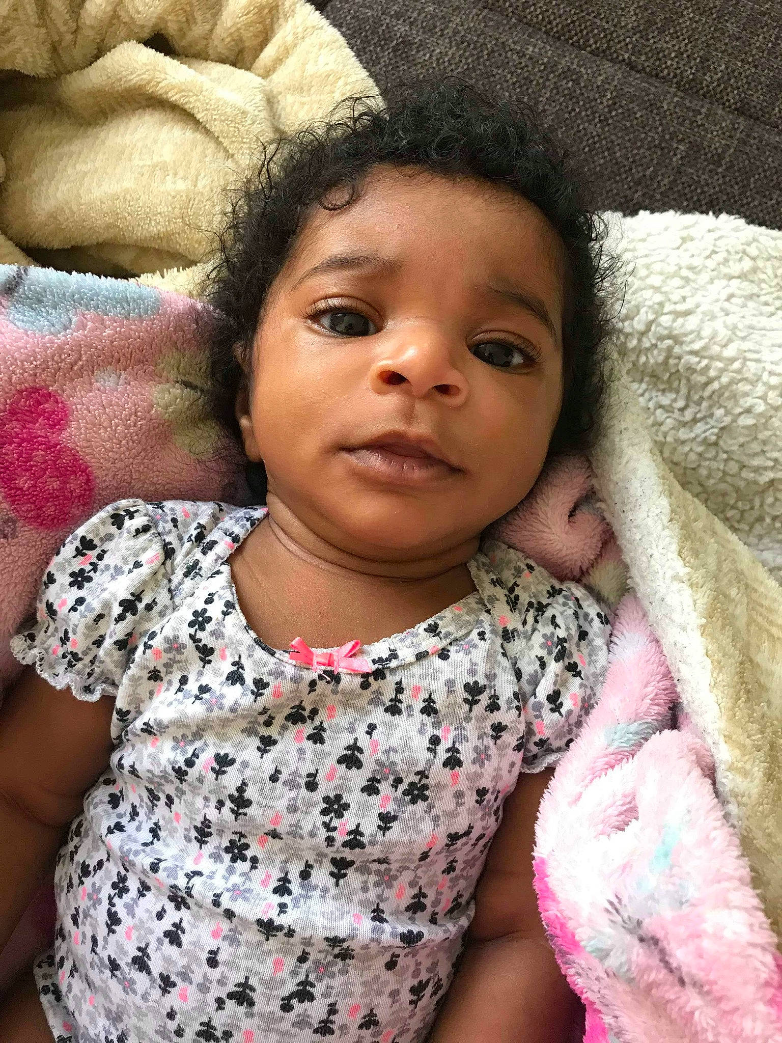 Amor' Capri is registered to the contest to win money with this photo: baby, cheek, child, eye, face, head, lip, nose, person, pink, skin, smile, toddler