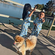Max joined the competition — help win amazing prizes! child, boy, girl, dog, pajamas, outdoor, daylight, water, pond, leash, shadow, tree, animal, pet, playful, summer, sky, clothing, fun, nature