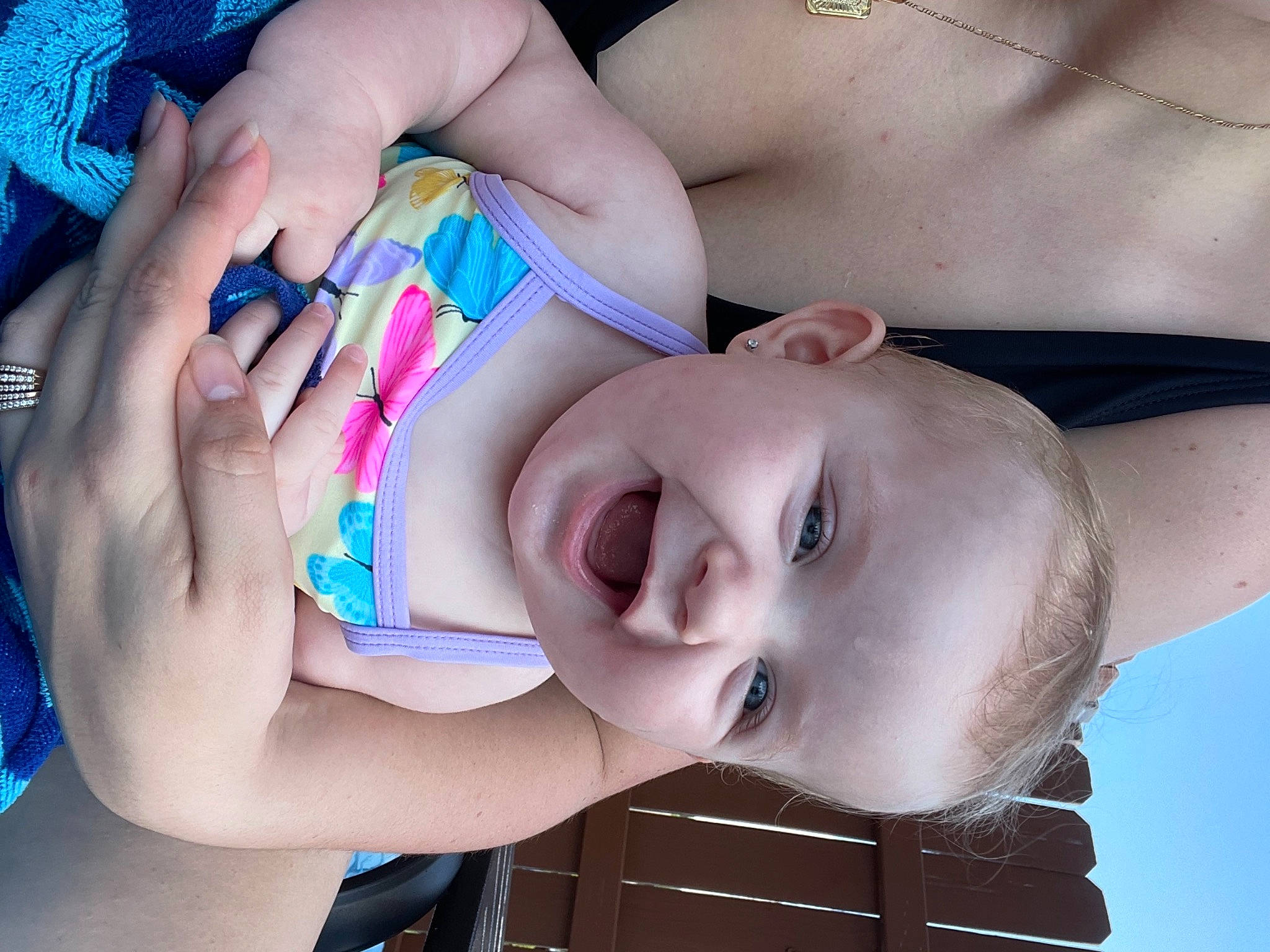 Lucie joined the competition — help win amazing prizes! baby, blue, chest, child, eyelash, face, fun, hairstyle, happy, head, headgear, human_body, lip, mouth, neck, person, shoulder, skin, smile, toddler