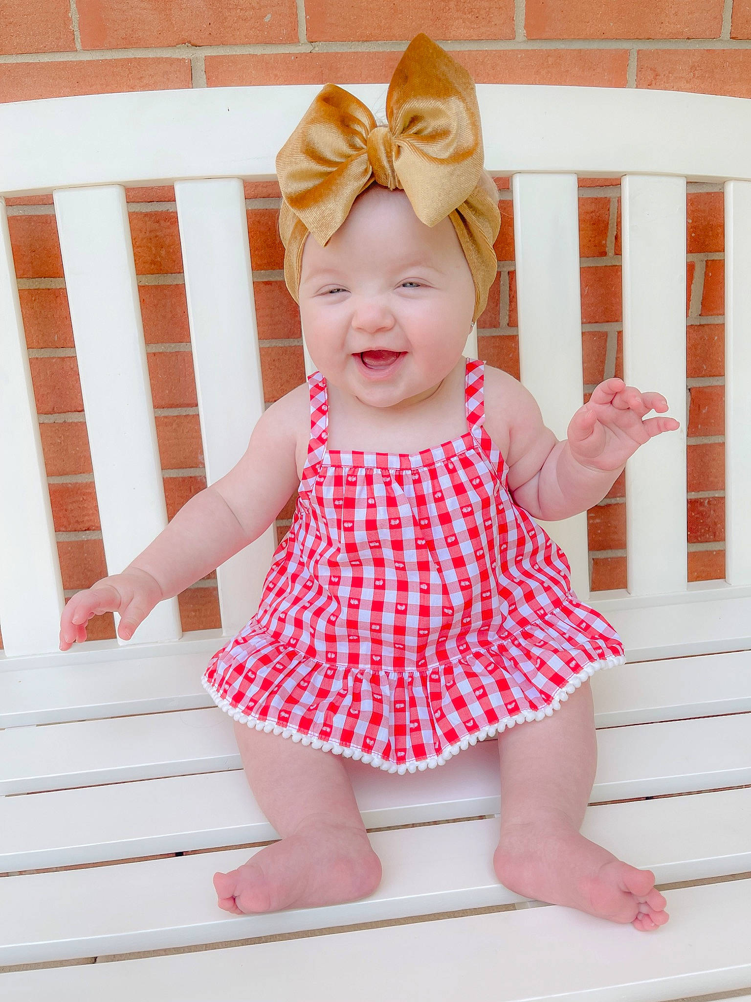 Lucie joined the competition — help win amazing prizes! baby, baby_toddler_clothing, child, day_dress, face, finger, fun, gesture, happy, headwear, magenta, one_piece_garment, pattern, peach, person, pink, sleeve, smile, thigh, thumb