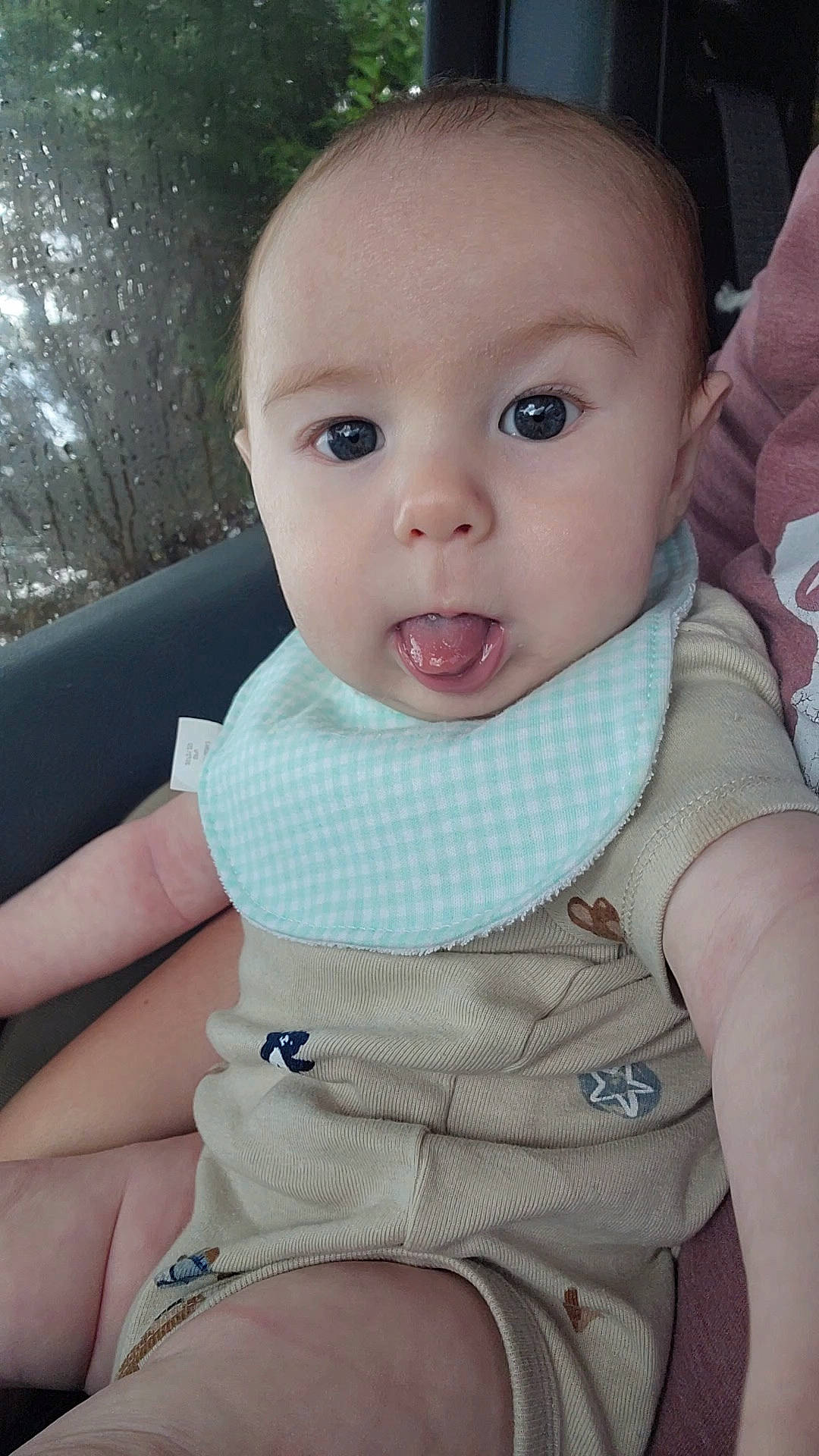 Emmett is registered to the contest to win money with this photo: baby, baby_safety, baby_toddler_clothing, cheek, child, chin, comfort, eyelash, happy, human_body, iris, lip, mouth, neck, nose, outerwear, person, skin, sleeve, surprise