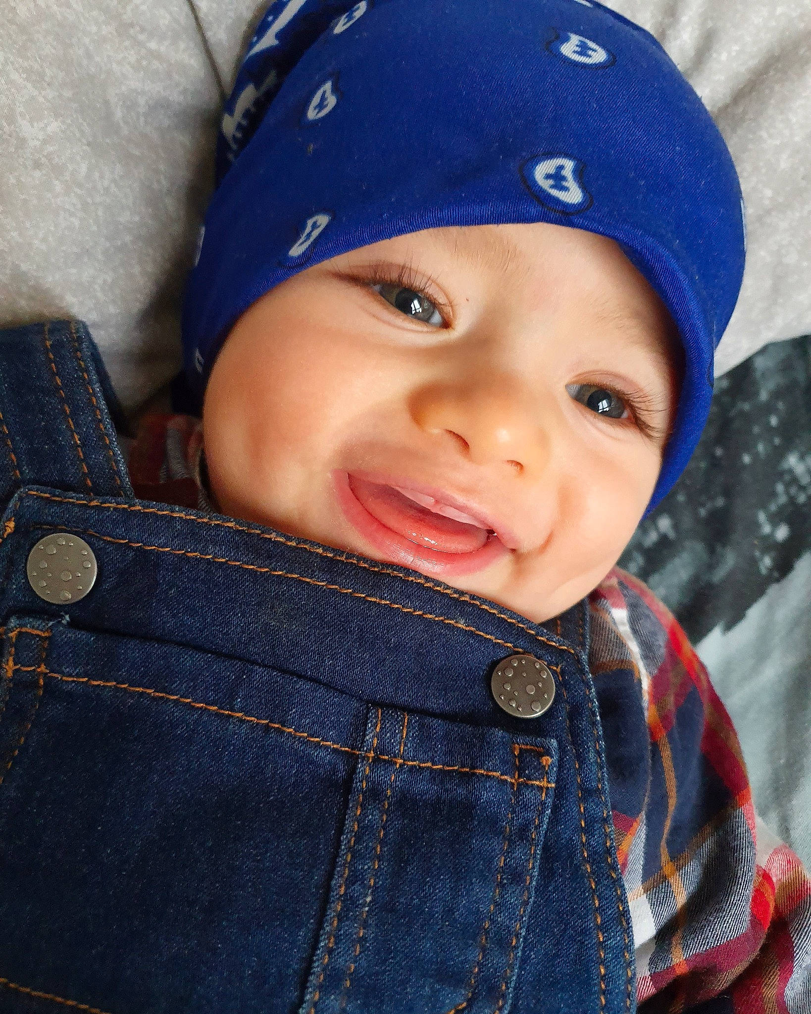 Jassim Mostafa participe au concours pour gagner de l'argent avec cette photo : baby, beanie, blue, cap, cheek, child, cool, denim, eye, face, facial_expression, head, headgear, jeans, lip, nose, organ, person, skin, smile