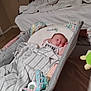 Makenzie joined the competition — help win amazing prizes! baby, bassinet, blanket, bedroom, sleeping, infant, crib, crocheted_blanket, pacifier, baby_clothing, indoor, quilt, resting, tiled_floor, bed, air_conditioner, comfort, sleep, person, soft_lighting