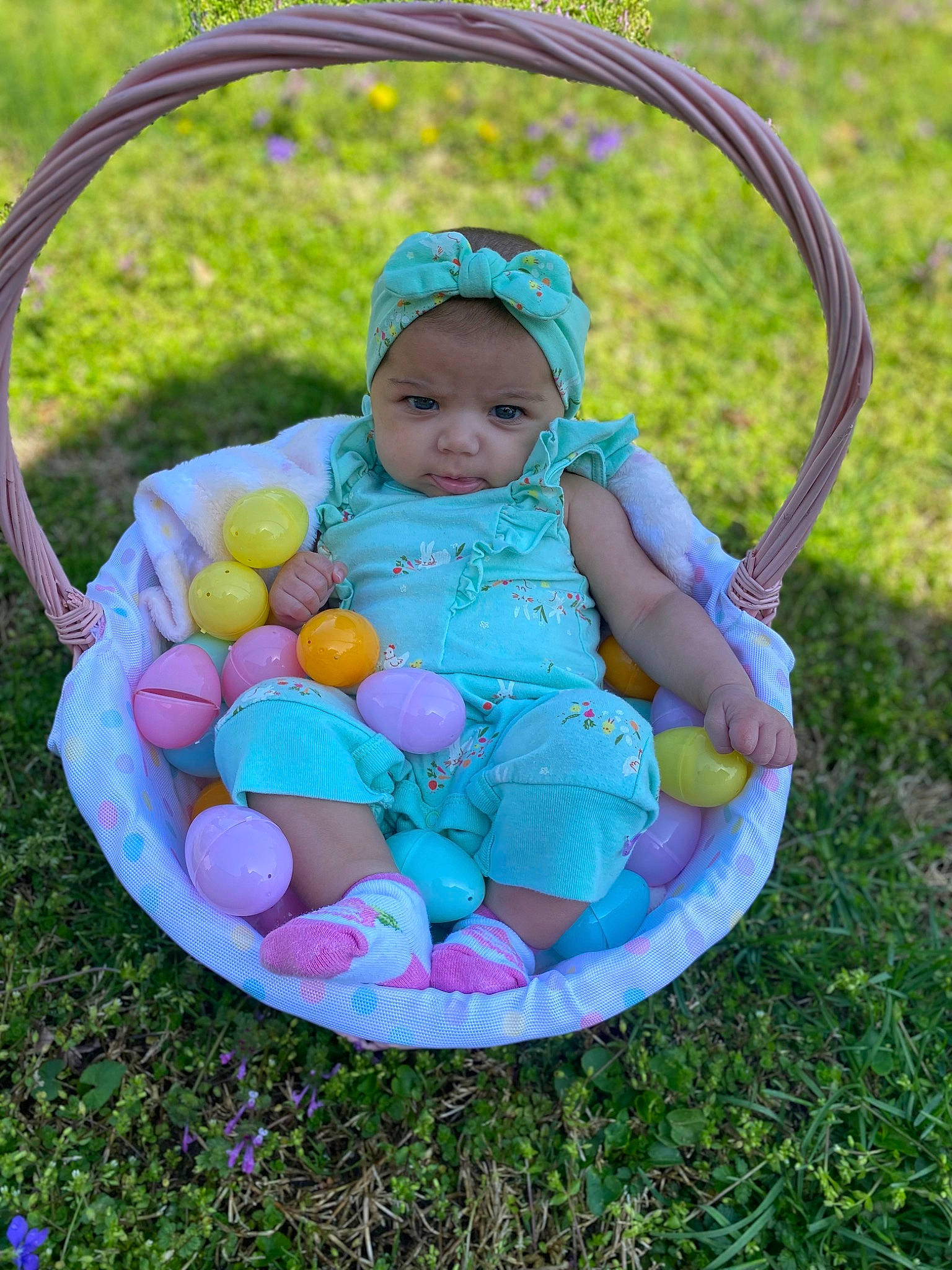 Amara is registered to the contest to win money with this photo: azure, baby, baby_products, baby_toddler_clothing, basket, child, electric_blue, event, fun, grass, happy, headwear, leaf, leisure, pattern, people_in_nature, person, plant, product, recreation