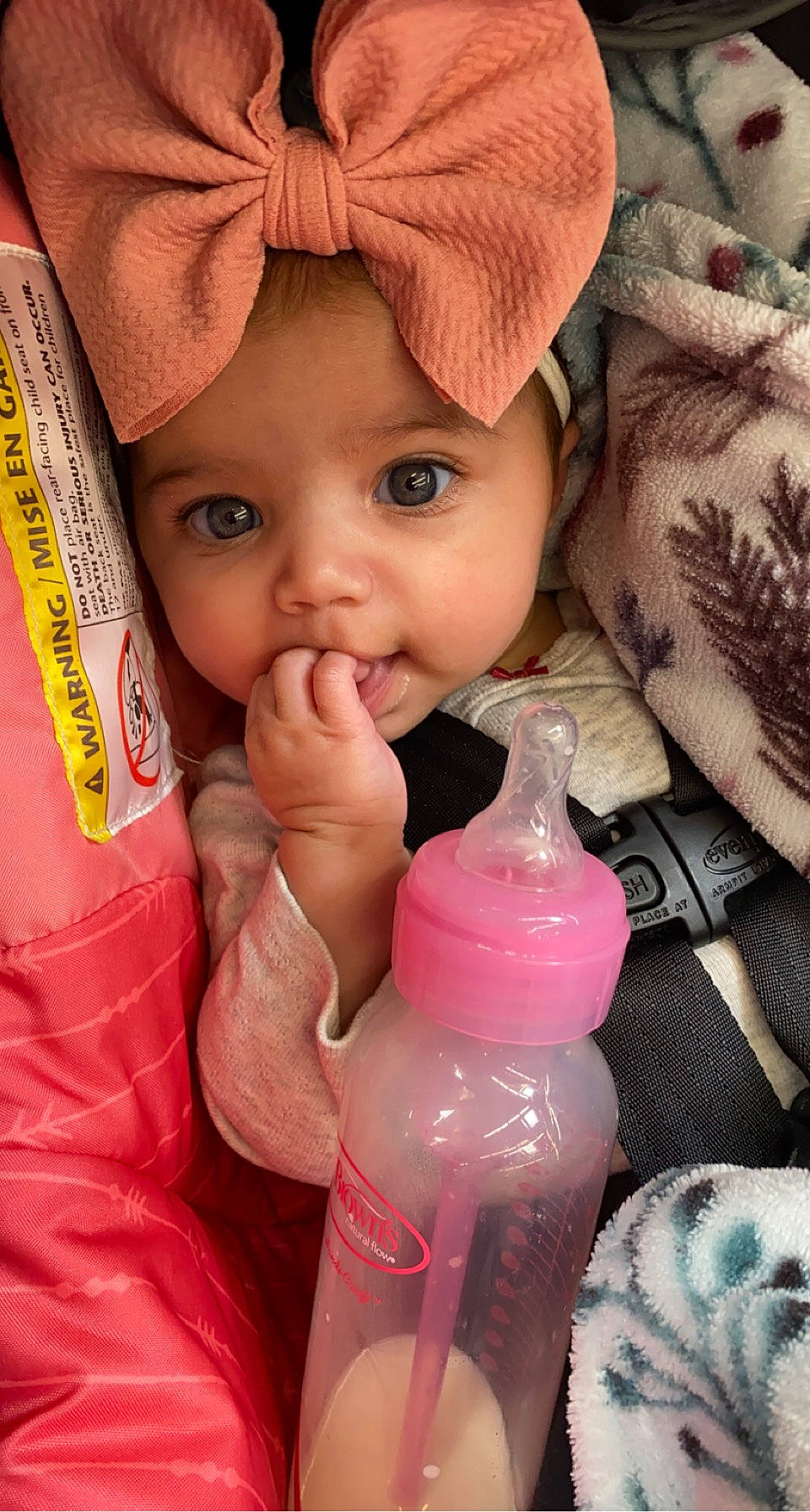 Amara joined the competition — help win amazing prizes! baby, baby_products, beauty, cap, cheek, child, drinkware, eyelash, finger, fun, happy, headwear, lip, magenta, nail, nose, person, pink, plastic_bottle, skin