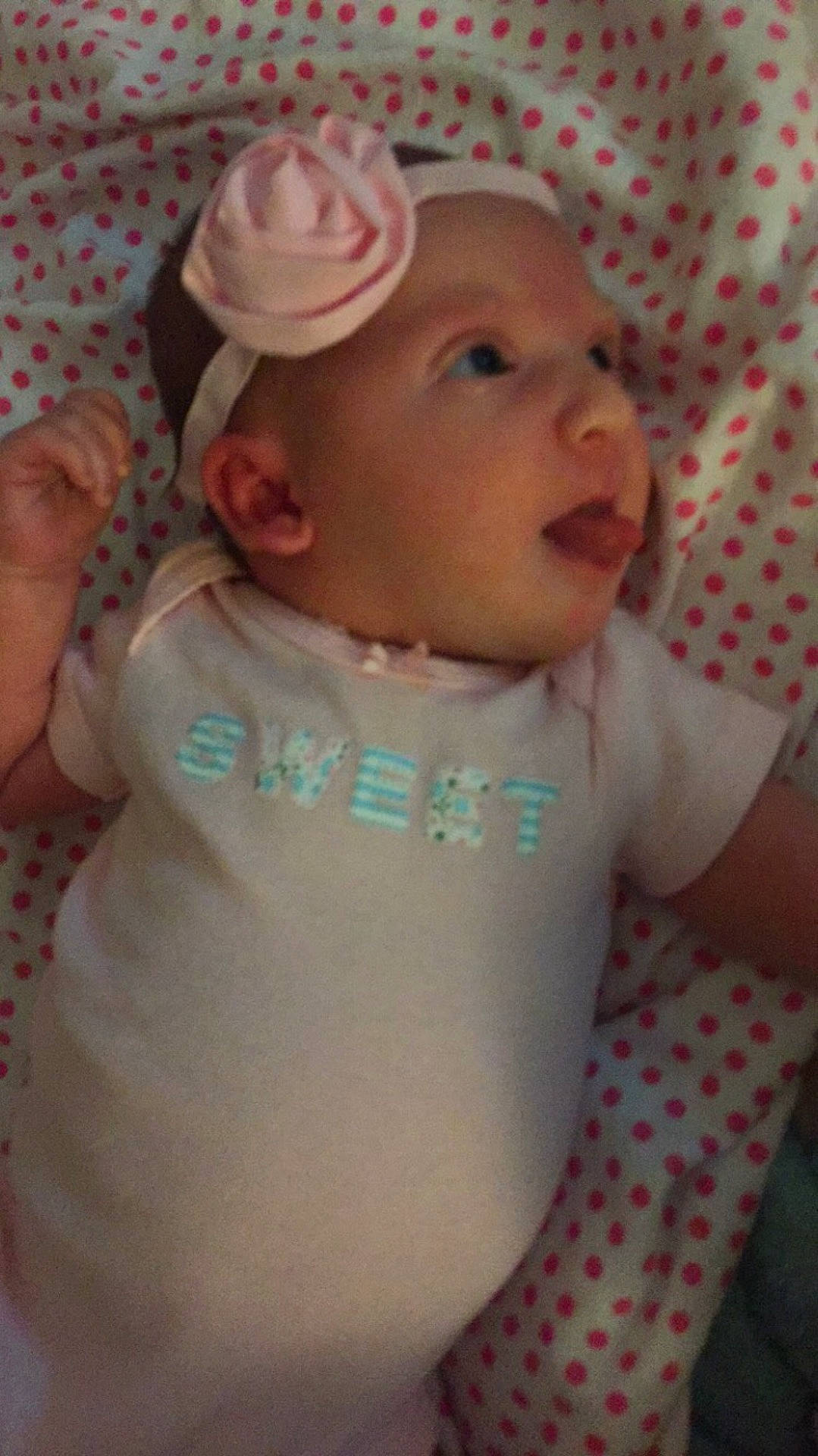 Braelynn is registered to the contest to win money with this photo: cheek, child, day, eye, face, finger, forehead, girl, hair_accessory, head, headgear, headwear, human_hair_color, infant, mouth, neck, nose, person, pink, product