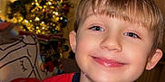 Roman joined the competition — help win amazing prizes! child, smile, christmas_tree, holiday, indoor, festive, tshirt, spiderman, lights, decoration, happy, face, portrait, young, cute, home, celebration, sparkle, red, white