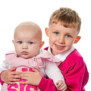 Roman joined the competition — help win amazing prizes! baby, toddler, child, portrait, smiling, holding, pink_clothing, white_background, cute, siblings, studio_photo, blue_eyes, short_hair, blond_hair, long_sleeves, happy, together, face, person, young