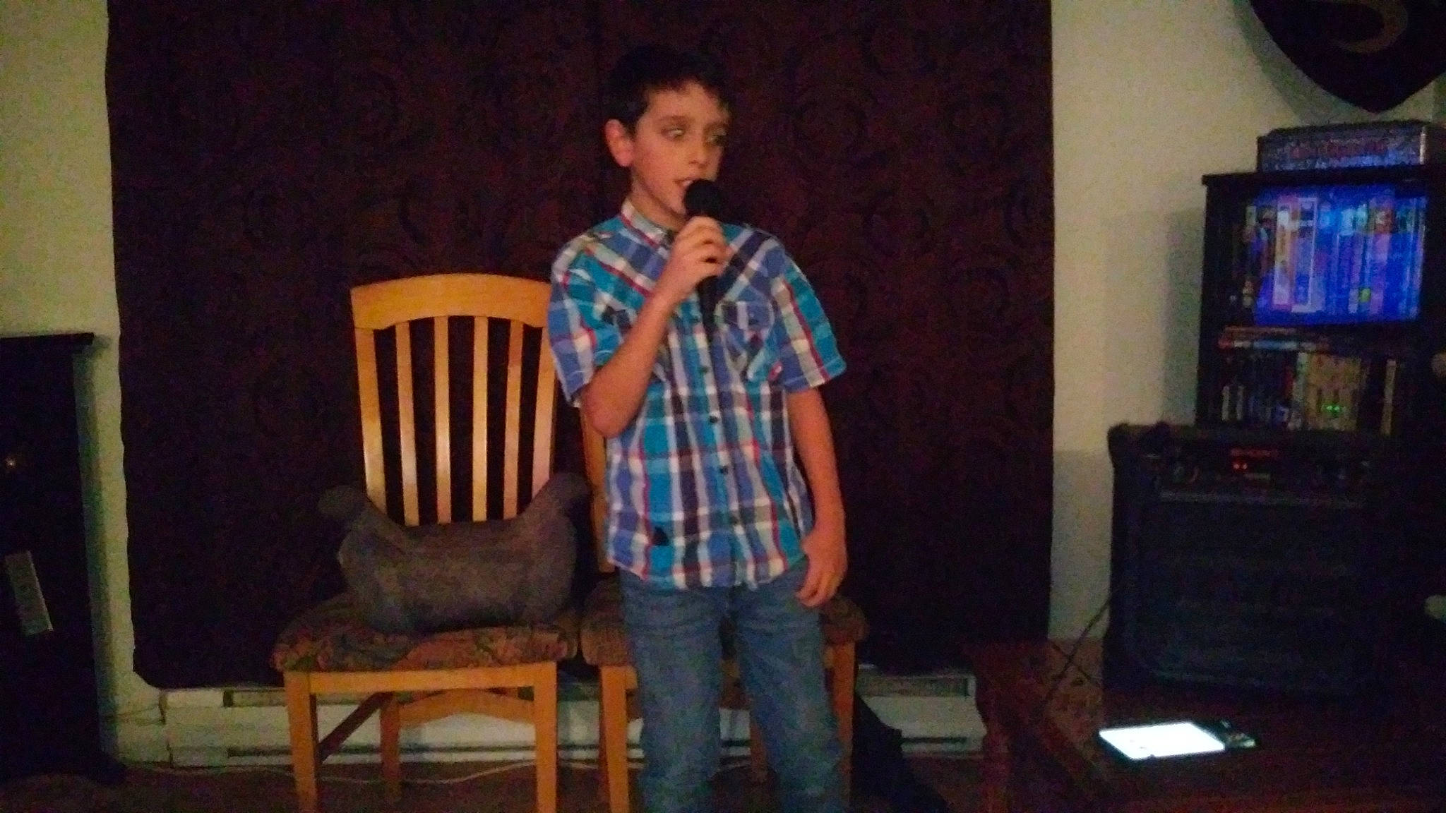 Loik joined the competition — help win amazing prizes! audio_equipment, chair, display_device, entertainment, entertainment_center, event, furniture, hardwood, jeans, living_room, pattern, person, plaid, room, sitting, stool, t_shirt, television, television_set, windsor_chair