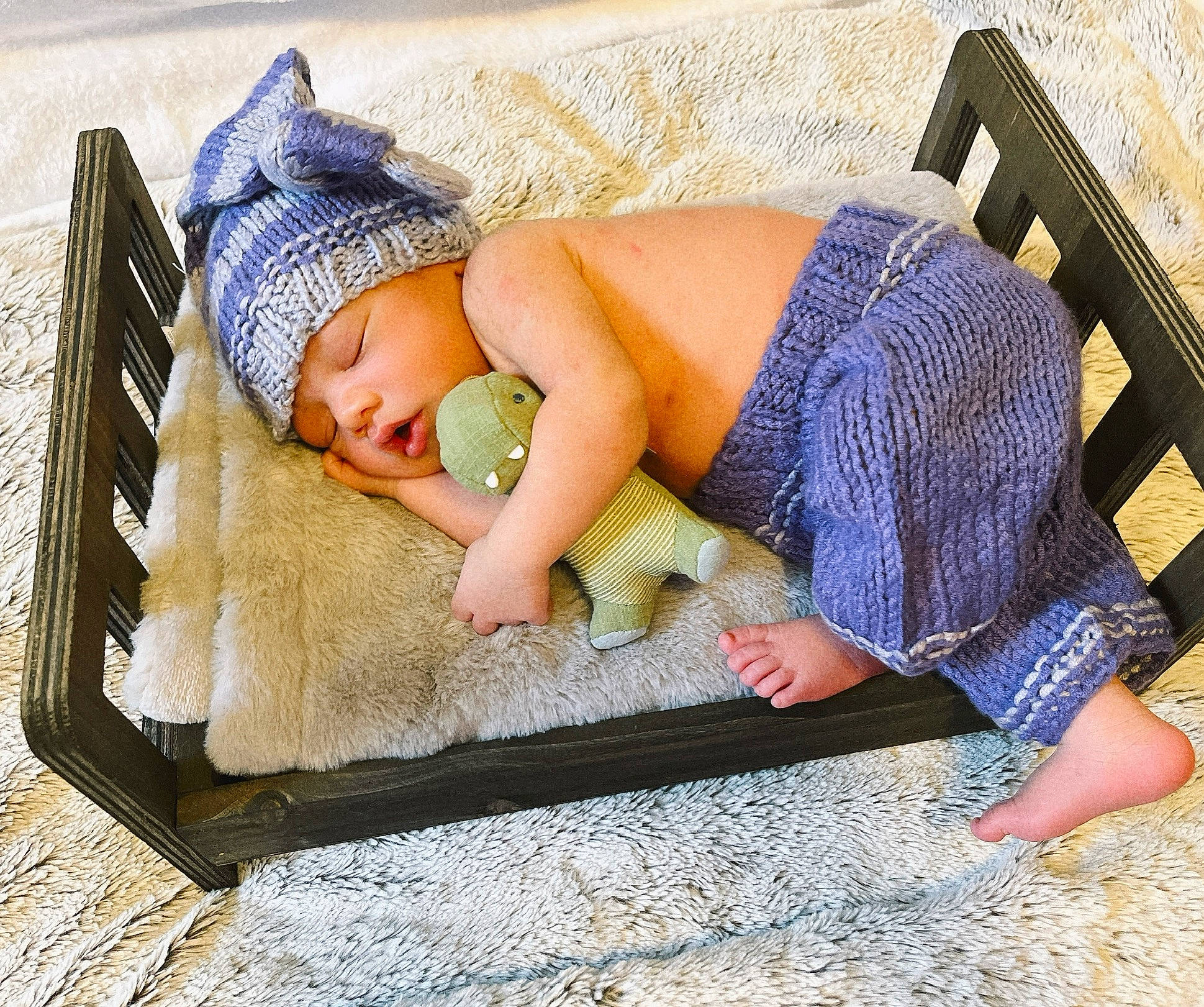 Jaxton joined the competition — help win amazing prizes! baby, baby_sleeping, baby_toddler_clothing, barefoot, comfort, electric_blue, flooring, foot, glasses, grass, headwear, human_leg, leisure, linens, outdoor_furniture, person, sitting, textile, thigh, toddler
