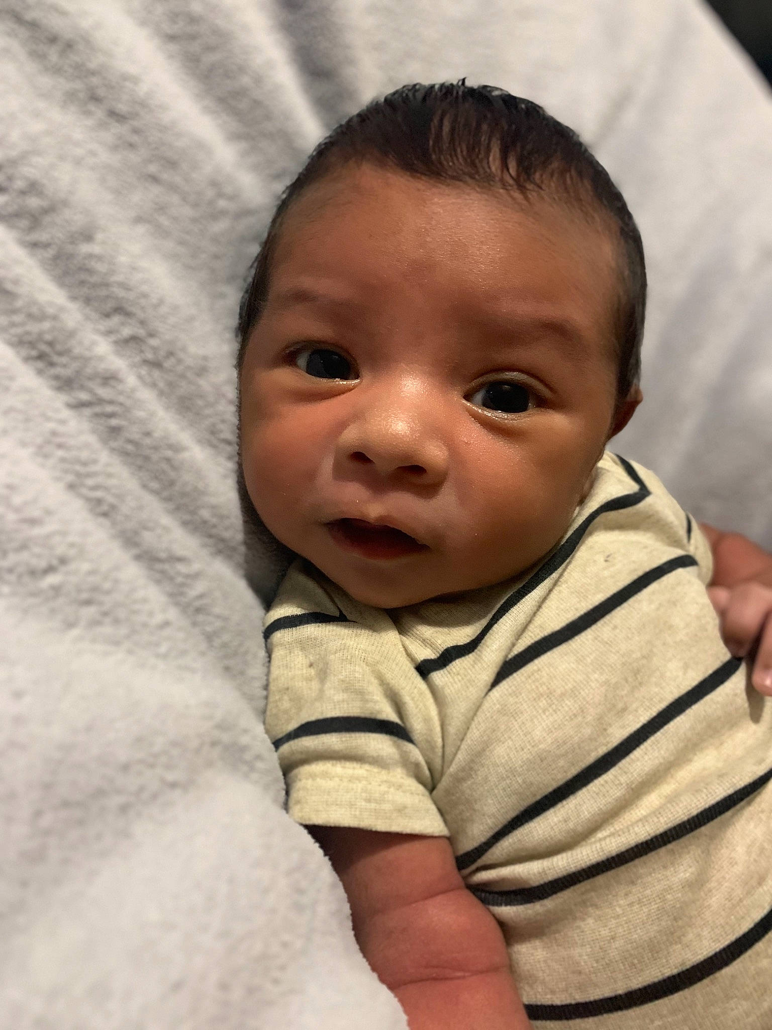 Jesus is registered to the contest to win money with this photo: baby, cheek, child, chin, comfort, eye, eyebrow, eyelash, face, forehead, gesture, happy, iris, lip, mammal, mouth, nose, person, skin, sleeve