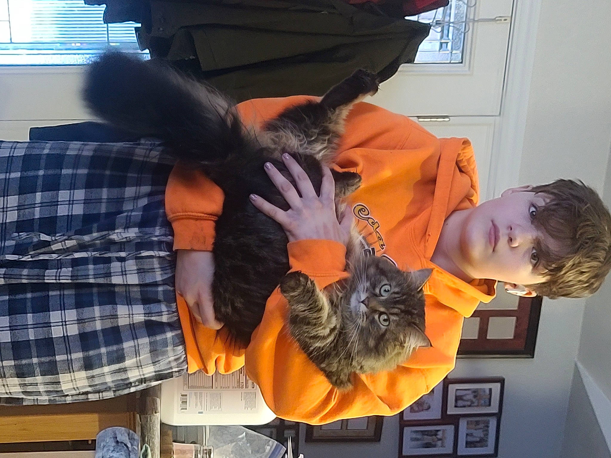 Abby is registered to the contest to win money with this photo: black_hair, comfort, cool, curtain, fun, fur, gesture, hair_coloring, long_hair, orange, pattern, plaid, room, selfie, tartan, window, window_blind, wrist