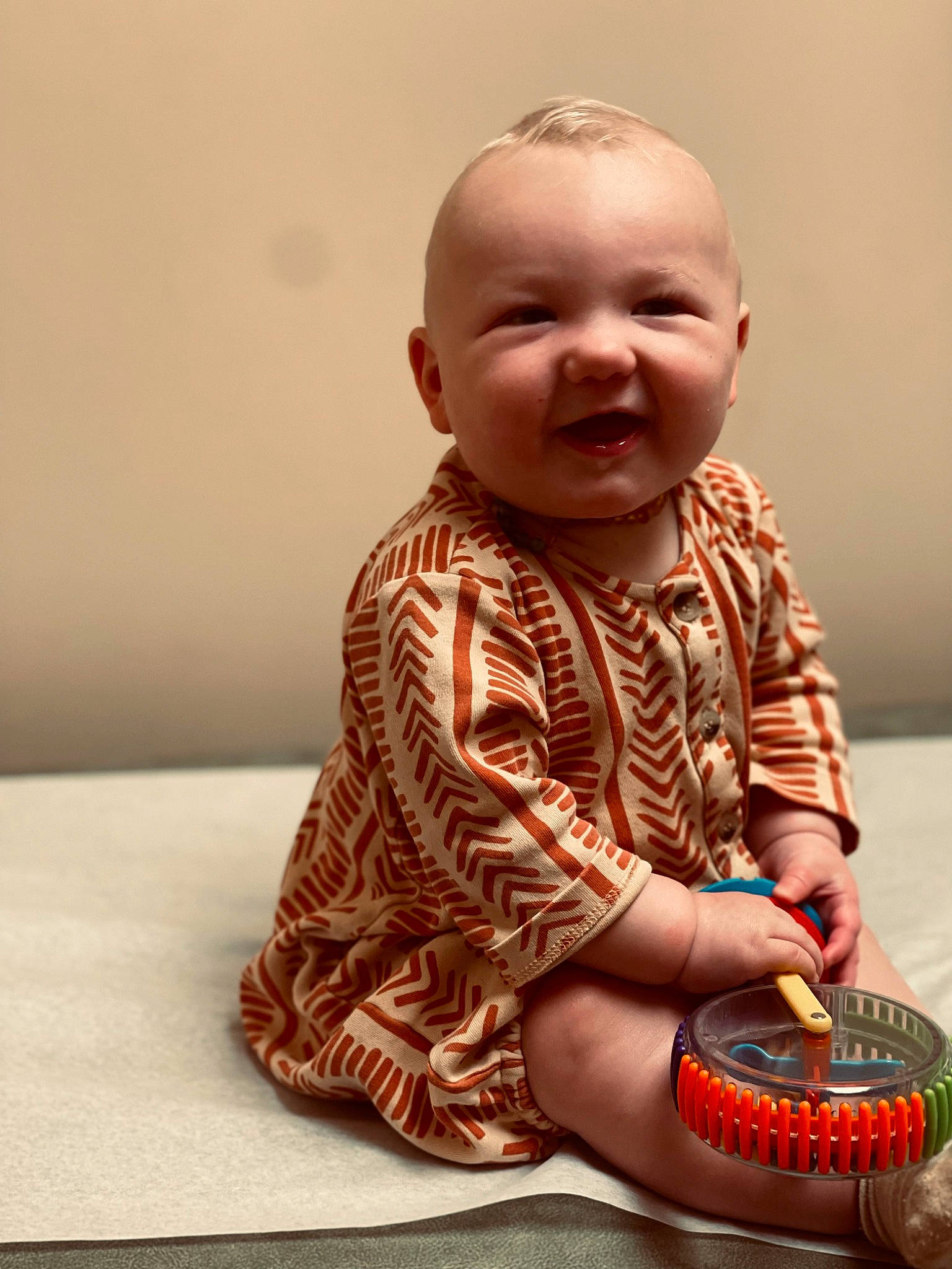 Hollis joined the competition — help win amazing prizes! art, baby, baby_toddler_clothing, cheek, child, eye, finger, flooring, fun, happy, nail, pattern, person, play, sitting, sleeve, smile, tin_can, toddler, toy
