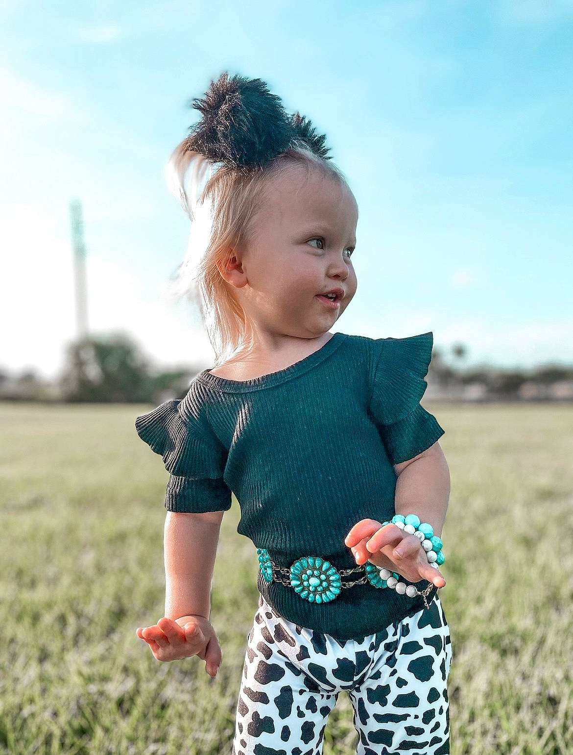Wrenlee joined the competition — help win amazing prizes! azure, baby_toddler_clothing, cool, face, facial_expression, grass, hairstyle, happy, human, outerwear, people_in_nature, person, shoulder, sky, sleeve, smile, standing, summer, sunlight, toddler