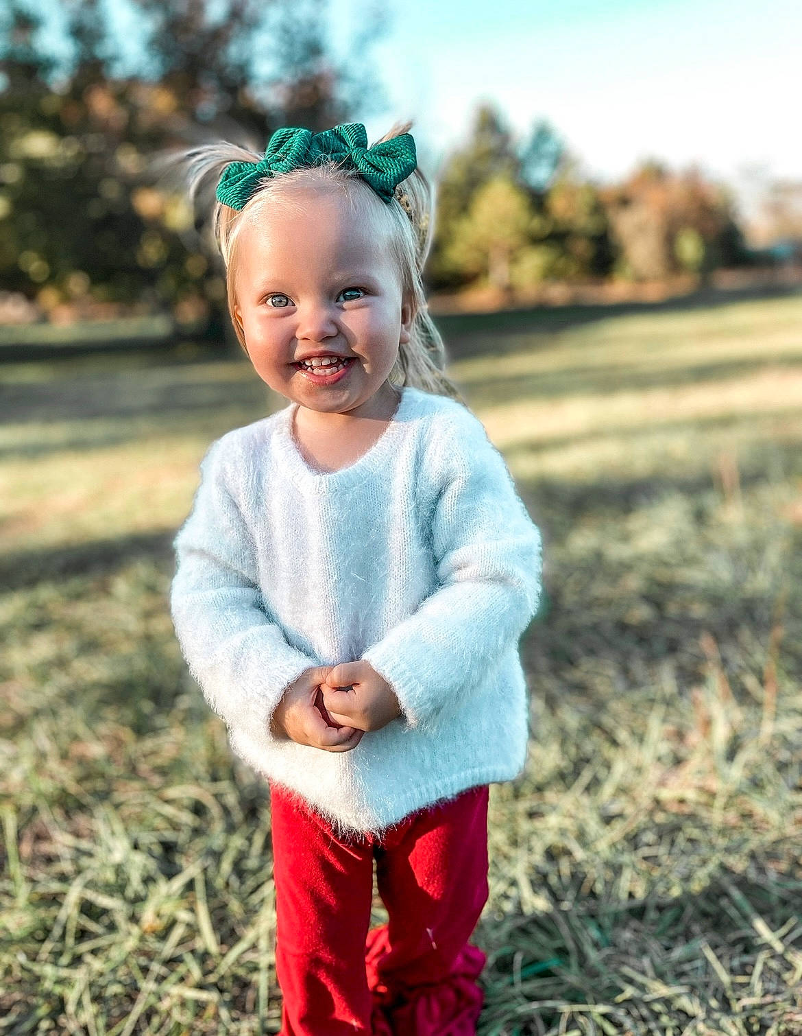 Wrenlee joined the competition — help win amazing prizes! baby_toddler_clothing, cool, eye, face, flash_photography, grass, grassland, happy, head, human_body, iris, joy, leaf, people_in_nature, person, plant, sleeve, smile, summer, sunlight