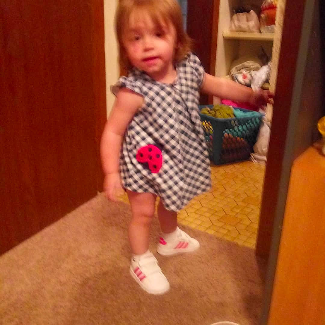 Cali joined the competition — help win amazing prizes! baby, cheek, child, dress, facial_expression, footwear, head, leg, nose, pattern, person, play, product, shoe, skin, smile, standing, toddler