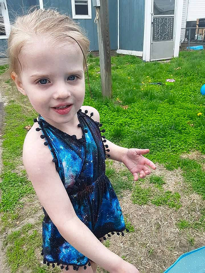 Alexandrina is registered to the contest to win money with this photo: backyard, blond, child, dress, face, fun, garden, grass, lawn, person, plant, play, smile, summer, toddler, tree, vacation, yard