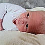 Kaden is registered to the contest to win money with this photo: baby, babylaughing, blanket, face, happy, head, newborn, person, photography, portrait, smile, yawning