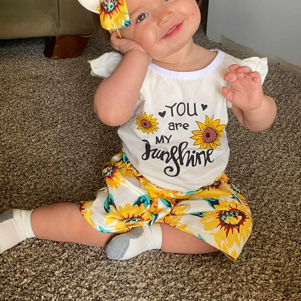 Emerie joined the competition — help win amazing prizes! accessories, baby, cap, clothing, costume, dress, face, hat, head, homedecor, hosiery, indoors, pants, person, photography, portrait, shorts, sitting, sock, t_shirt