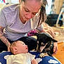 Micah joined the competition — help win amazing prizes! animal, baby, casual, child, clothing, comfort, curious, cushion, dog, face, floor, hand, home, indoor, interaction, person, pet, portrait, tattoo, woman