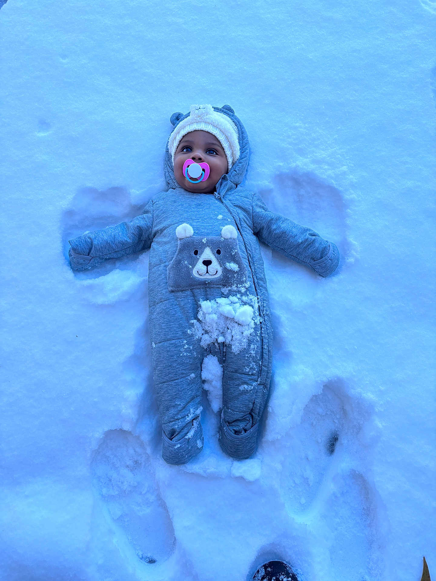 Alaja joined the competition — help win amazing prizes! baby, child, clothing, cold, cute, footprints, frozen, gloves, happy, hat, infant, lying_down, outdoor, pacifier, play, portrait, snow, snow_angel, snowsuit, winter