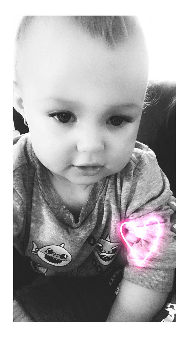 Rohnwyn is registered to the contest to win money with this photo: baby, black_and_white, cheek, ear, eyebrow, eyelash, facial_expression, finger, flash_photography, gesture, happy, head, iris, lip, mouth, neck, nose, person, skin, sleeve