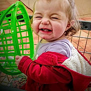 Wednesday joined the competition — help win amazing prizes! accessories, architecture, baby, babylaughing, ball, balloon, basket, blanket, blonde, bodypart, building, chair, clothing, coat, crib, dress, earring, face, finger, fleece