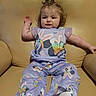 Wednesday is registered to the contest to win money with this photo: architecture, baby, blonde, bodypart, building, chair, clothing, couch, cushion, dress, face, finger, footwear, furniture, hair, hand, head, homedecor, indoors, livingroom