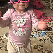 Brooklyn joined the competition — help win amazing prizes! toddler, pink_sunglasses, heart_shaped_glasses, cat_shirt, child, carpet, toy_car, toy_money, indoor, blur, motion, cute, clothing, playtime, child_with_glasses, patterned_rug, pink_toy, floor, happy, young_child