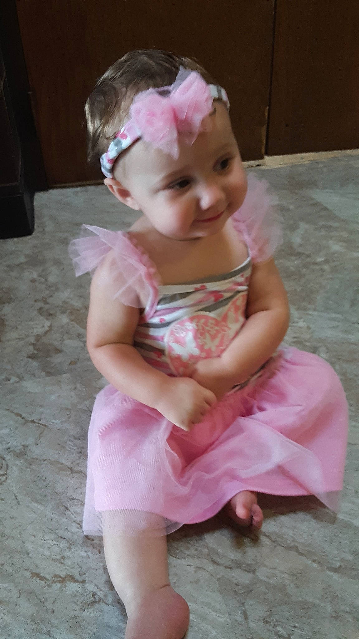 Aryah is registered to the contest to win money with this photo: baby, cheek, child, costume, doll, dress, hair_accessory, headgear, joy, person, pink, toddler