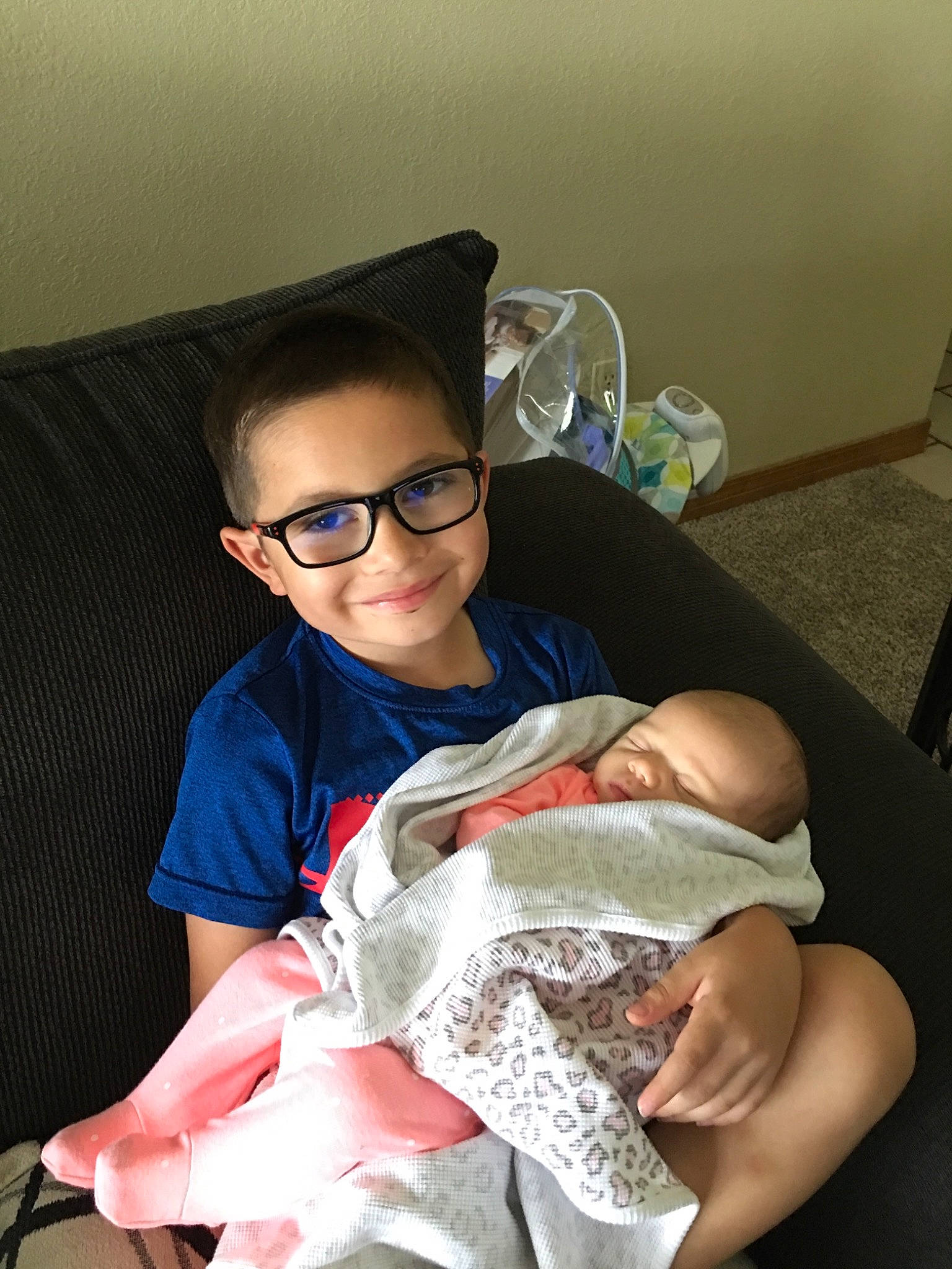 Ayden joined the competition — help win amazing prizes! arm, baby, birth, child, eyewear, glasses, leg, person, sitting, toddler, vision_care