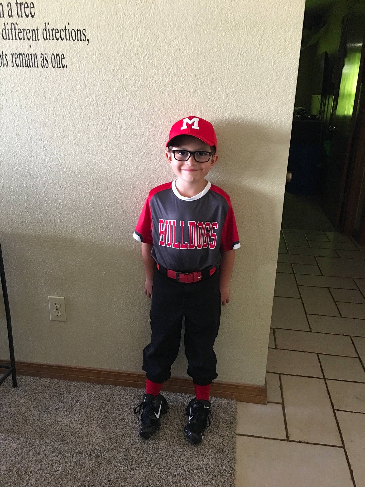 Ayden is registered to the contest to win money with this photo: cap, child, cool, footwear, fun, headgear, headwear, joint, male, person, red, roller_skates, shoe, shoulder, sleeve, sportswear, standing, style, t_shirt, white